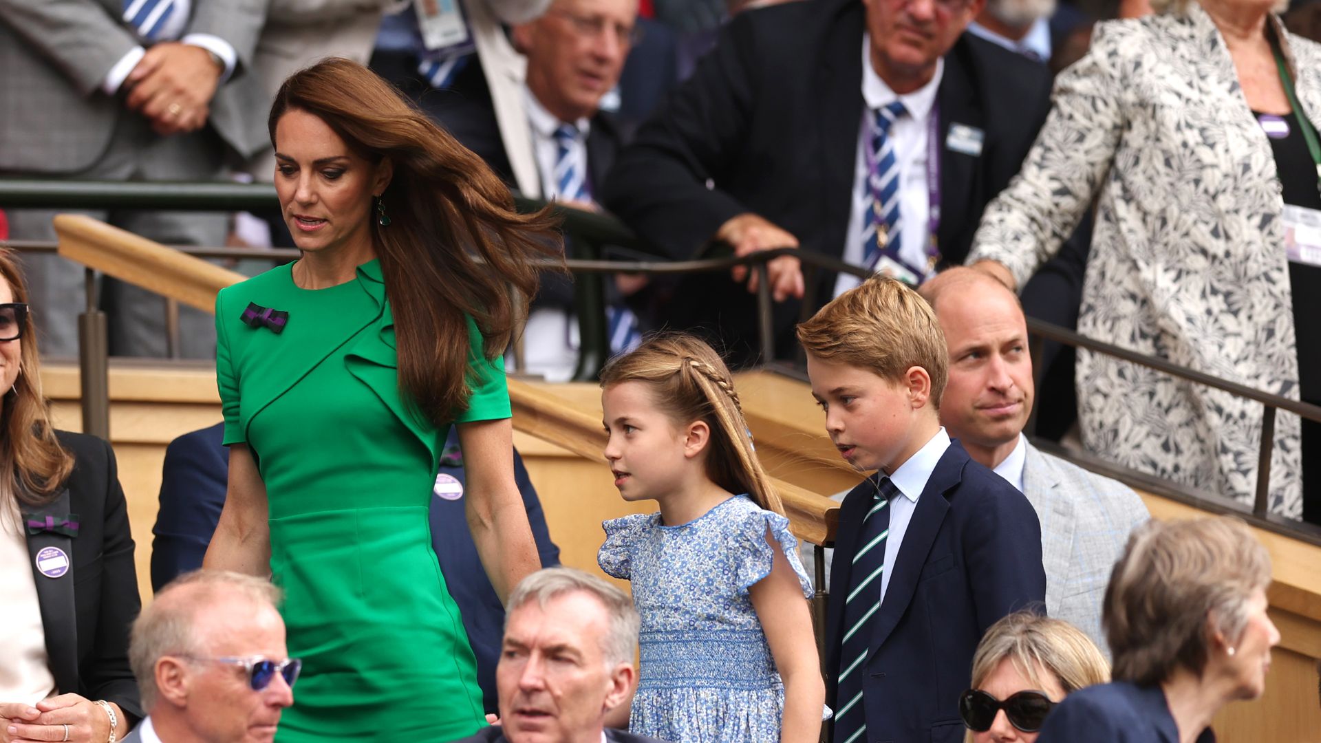 Kate leading George and Charlotte into the royal box at Wimbledon