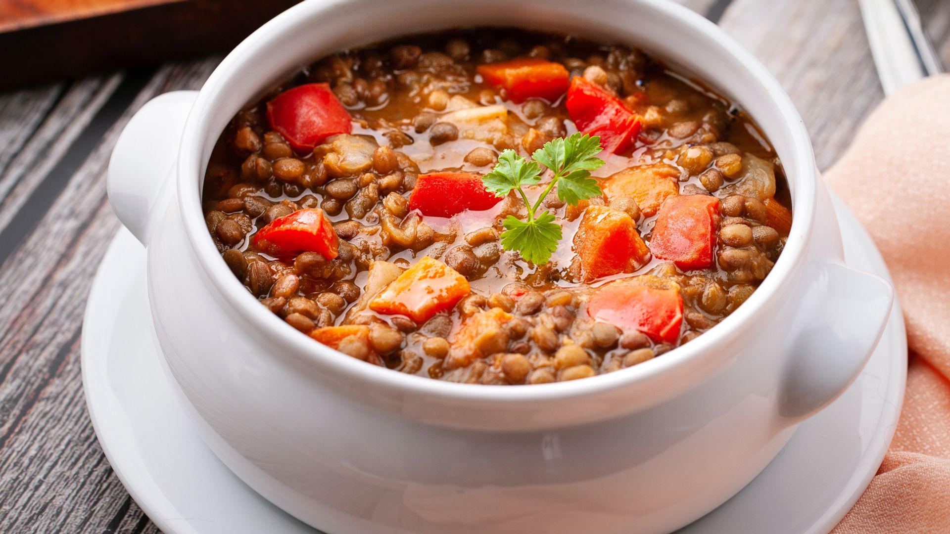 Front view of lentils soup with vegetables