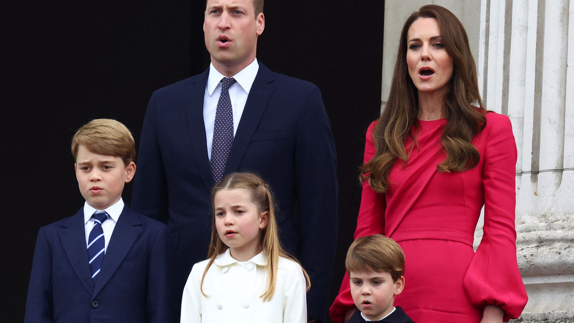 Kate and William on the royal balcony with their children
