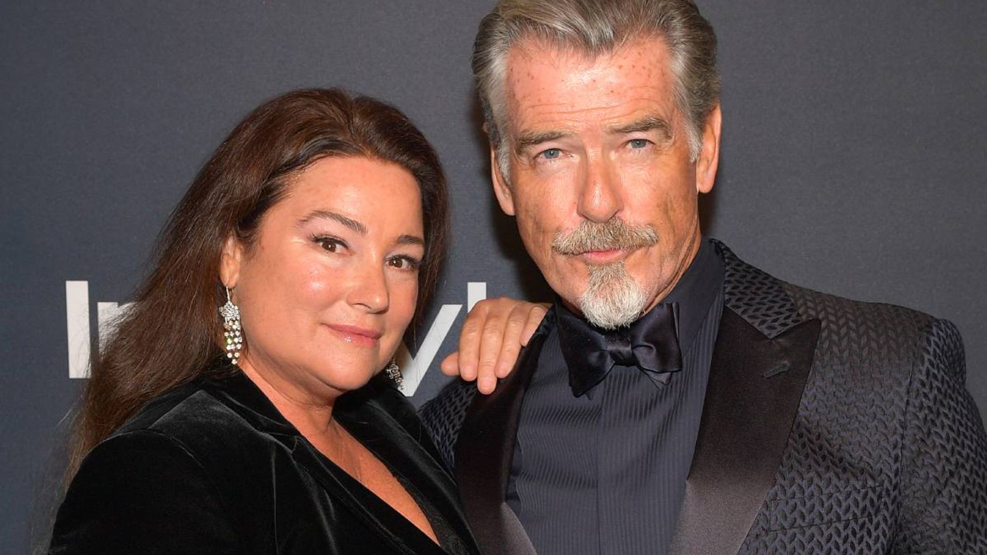 Pierce Brosnan and wife Keely Shaye Brosnan surprise onlookers during
