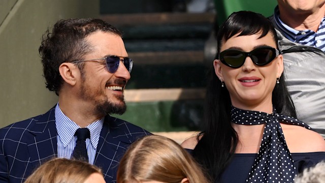 Orland Bloom and Katy Perry sitting courtside at Wimbledon