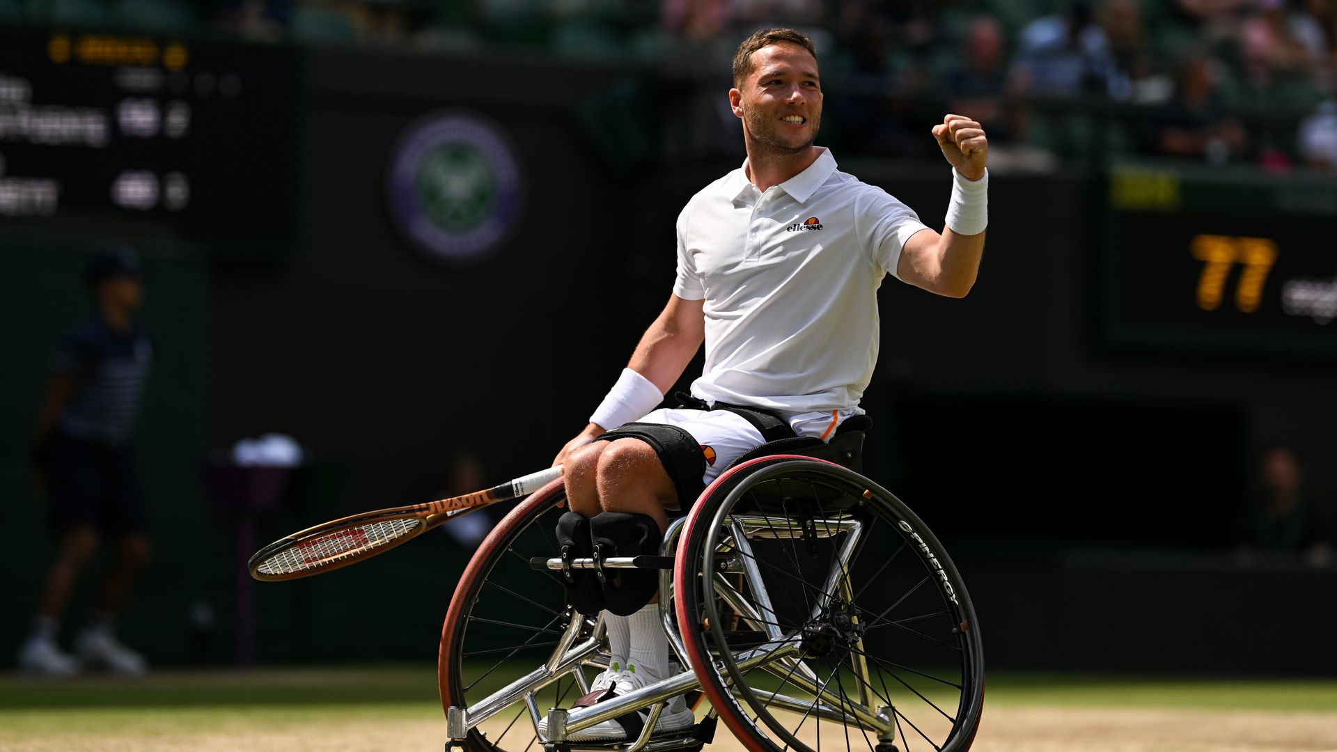 Alfie Hewett in a wheelchair with a tennis racquet