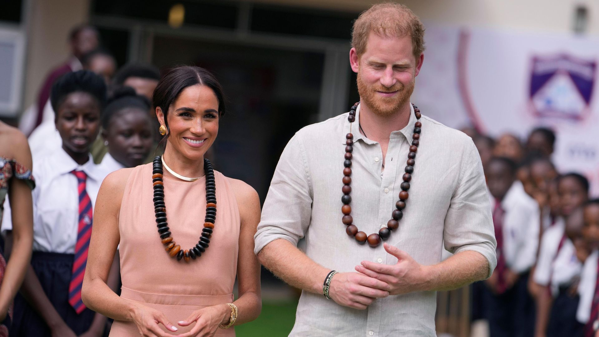 Prince Harry and Meghan Markle kick off day one in Nigeria with school visit 