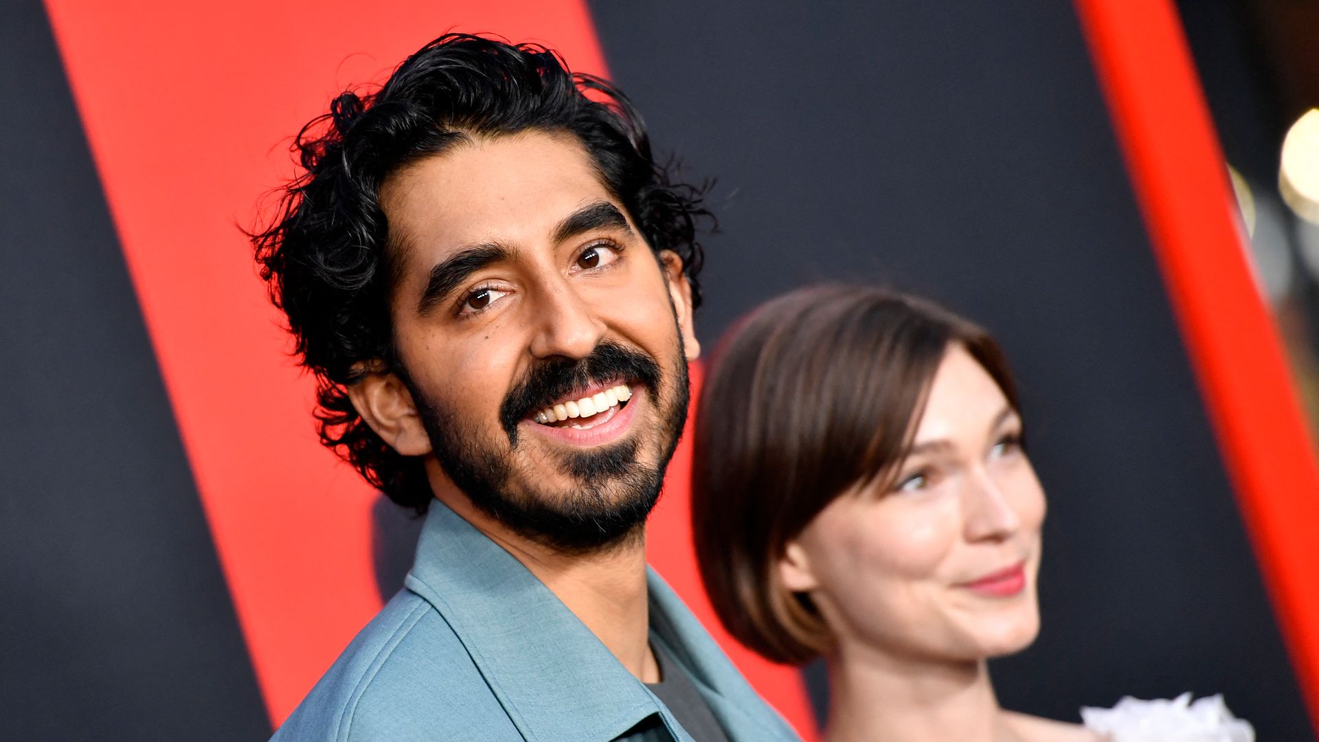 British filmmaker and actor Dev Patel (L) and Australian actress Tilda Cobham-Hervey arrive for the premiere of "Monkey Man" at the TCL Chinese Theatre in Hollywood, California, on April 3, 2024.