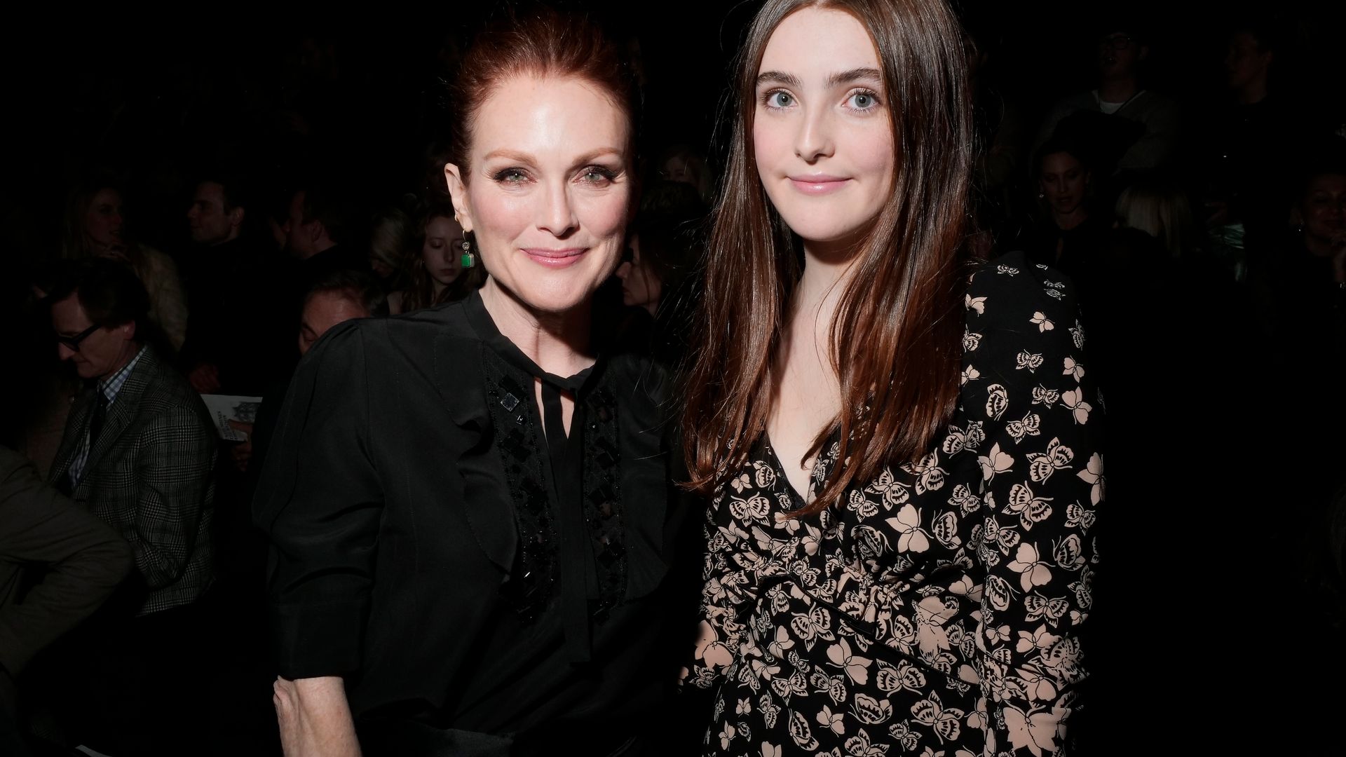 Julianne Moore and Liv Freundlich in the front row (Photo by Swan Gallet/WWD/Penske Media via Getty Images)l