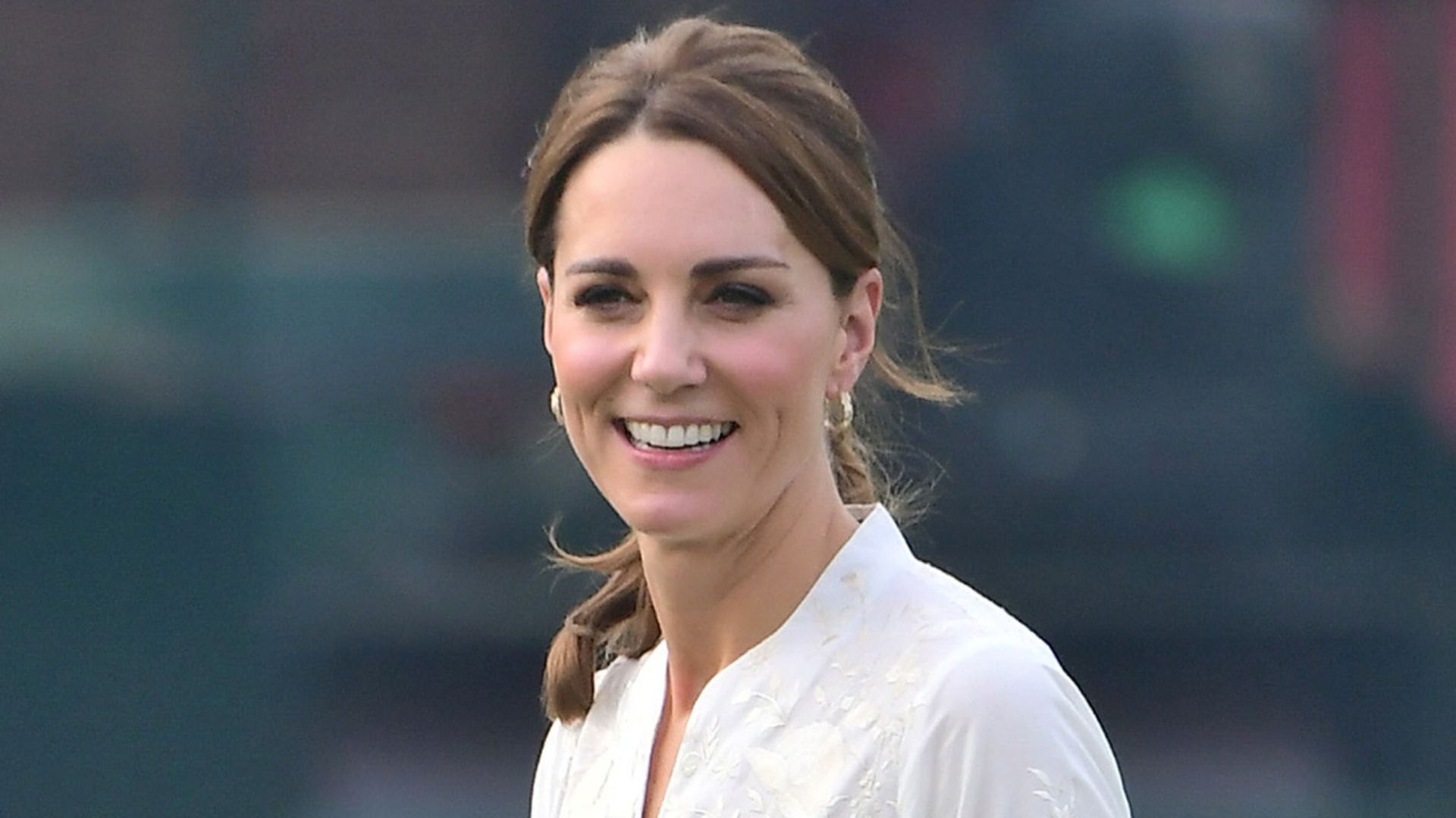 Kate Middleton ties hair up and sports trainers for the cricket