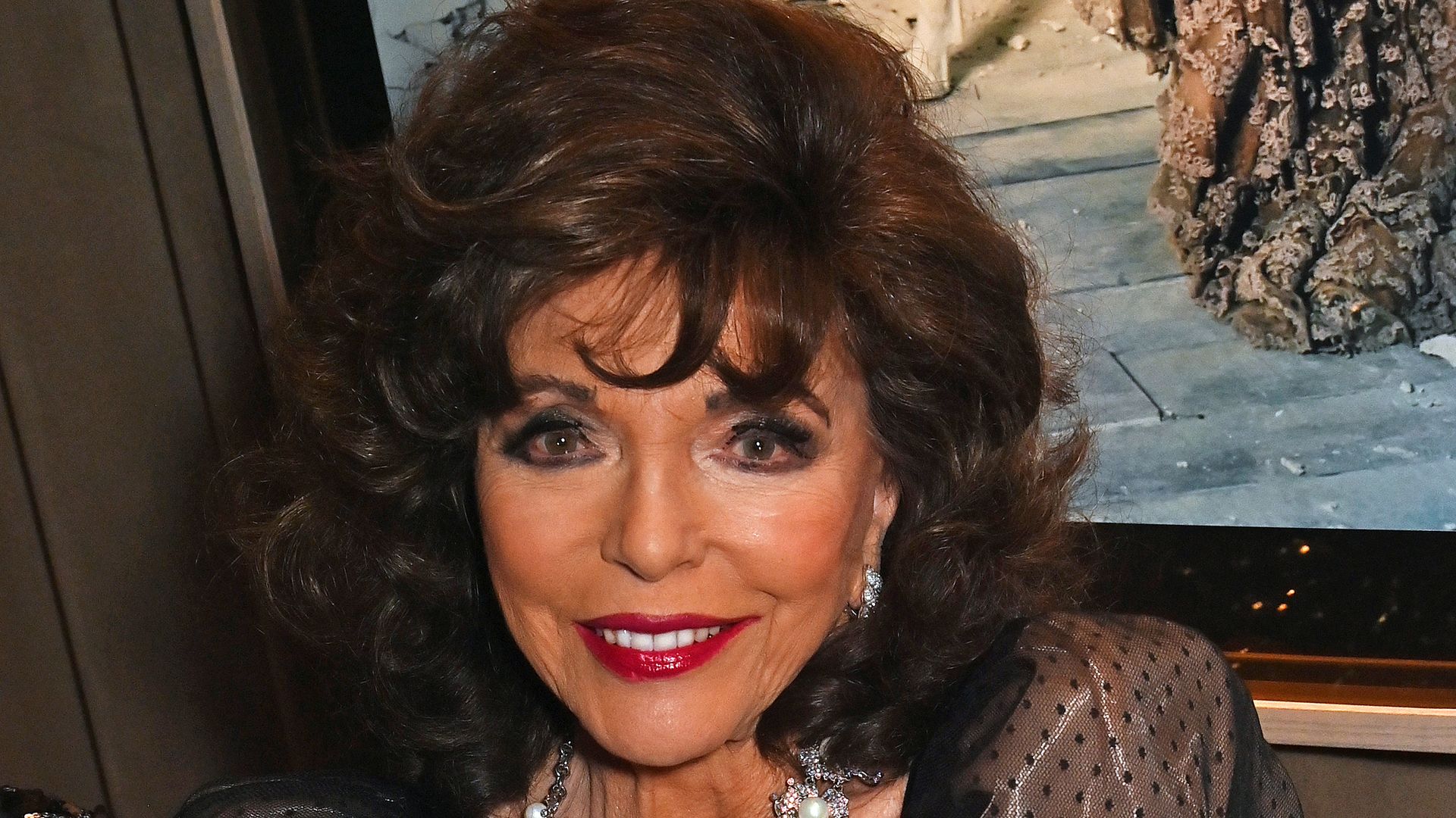 joan collins in black dress at Variety Club Showbusiness Awards 