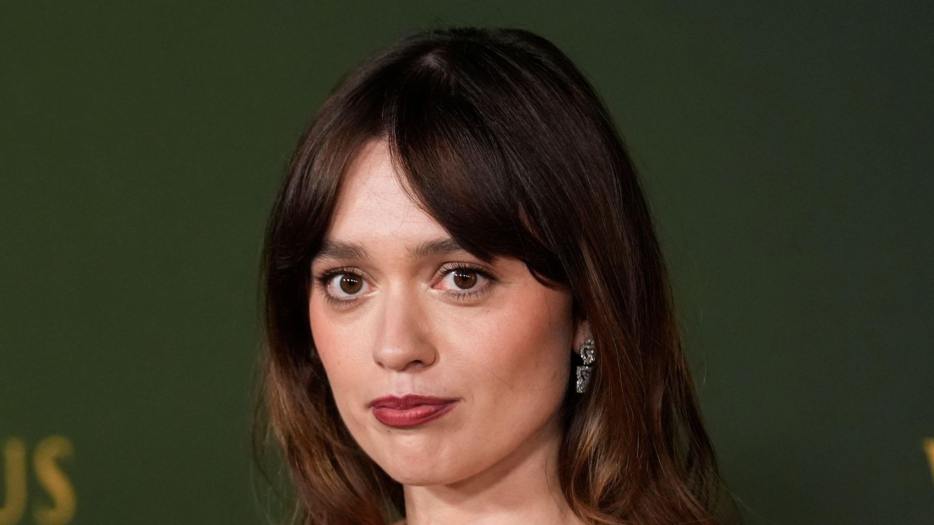 aimee lou wood at premiere in burgundy dress 