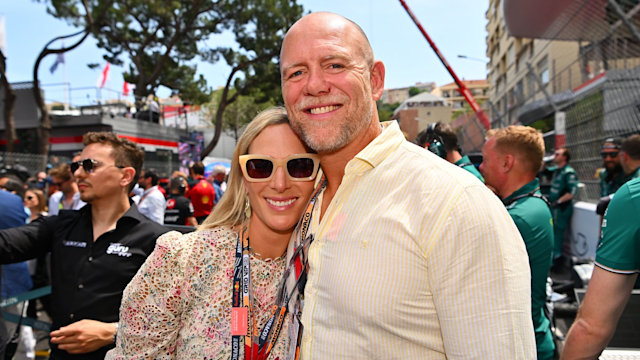 Mike Tindall and Zara Tindall pose for a photo on the grid during the F1 Grand Prix of Monaco