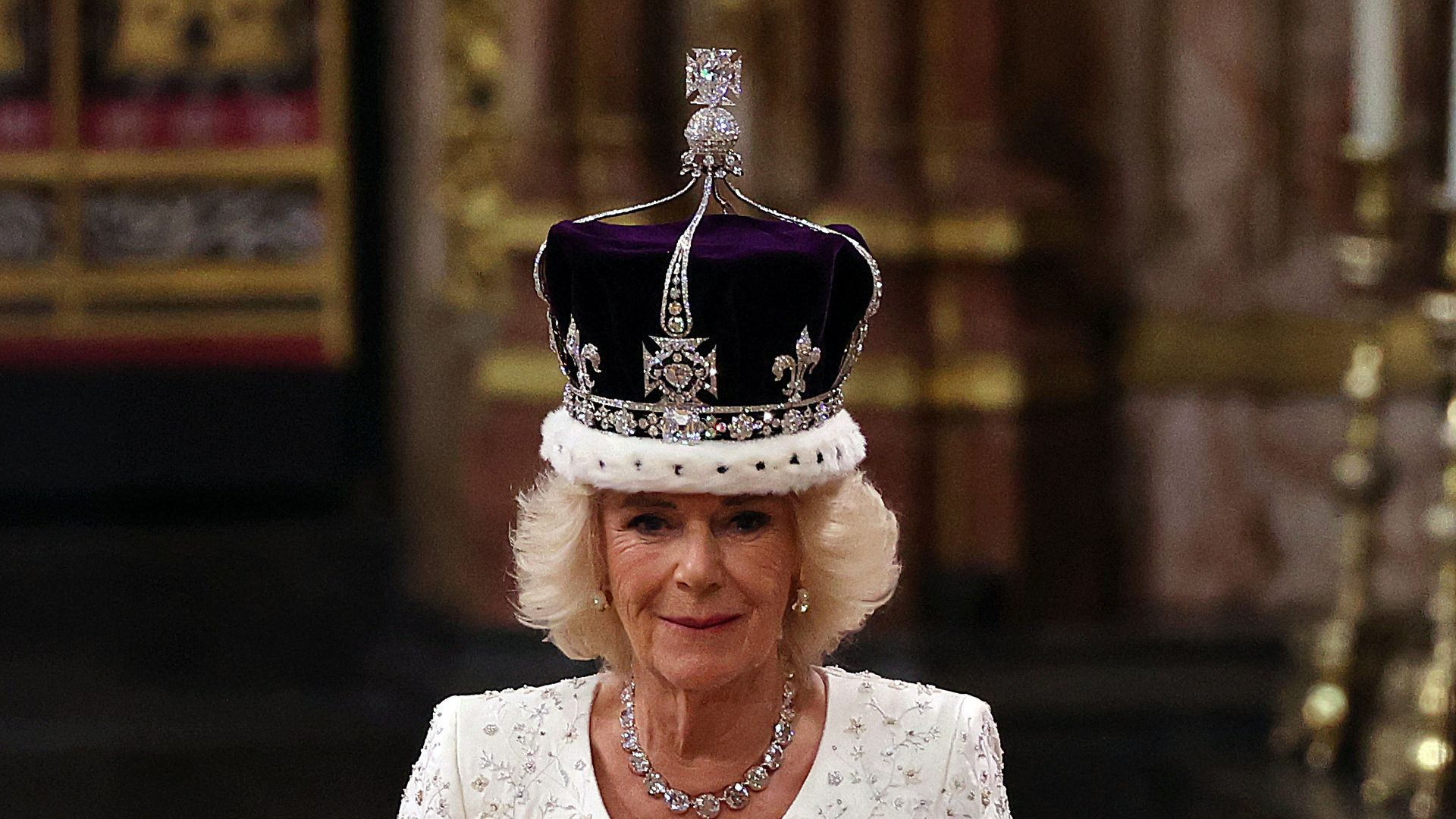 Britain's Camilla walks wearing a modified version of Queen Mary's Crown