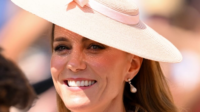 Catherine, Princess of Wales shoulders up in blush jacket and hat
