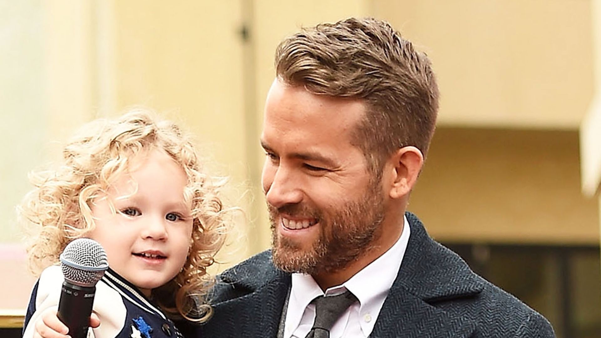 Actor Ryan Reynolds (R) poses for a photo with his daughter, James Reynolds during a ceremony honoring him with a star on the Hollywood Walk of Fame on December 15, 2016 in Hollywood, California.