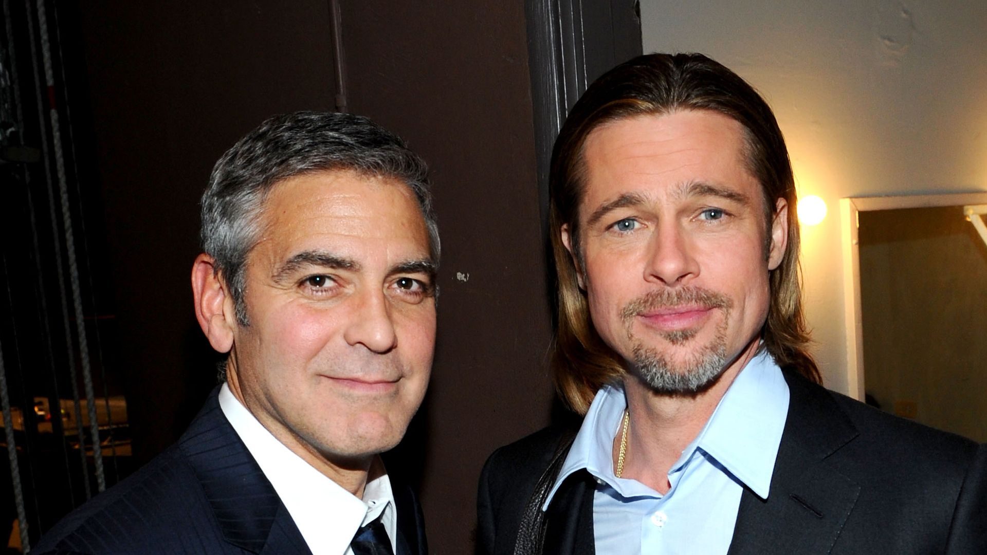 Actors Brad Pitt (L) and George Clooney attend the one-night reading of "8" presented by The American Foundation For Equal Rights & Broadway Impact at The Wilshire Ebell Theatre on March 3, 2012 in Los Angeles, California