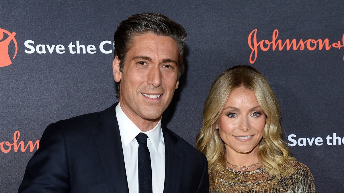 Kelly Ripa is supported by David Muir after an emotional moment away from home