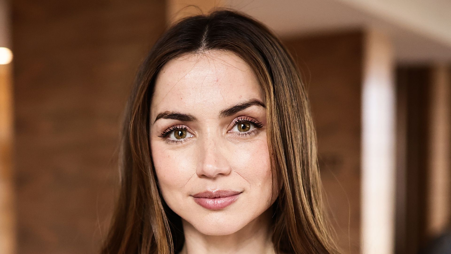  Ana de Armas shoulders up in lilac cardigan