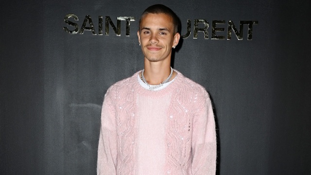 Romeo Beckham attends the Saint-Laurent Womenswear Fall/Winter 2022/2023 show as part of Paris Fashion Week