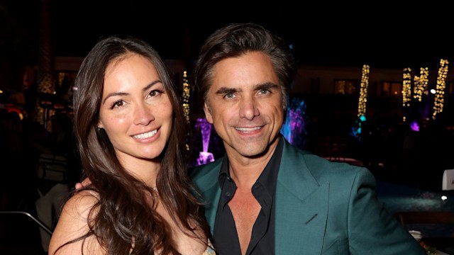 Caitlin McHugh and John Stamos attend the World Premiere of Disney's live-action feature "The Little Mermaid" at the Dolby Theatre in Los Angeles, California on May 08, 2023