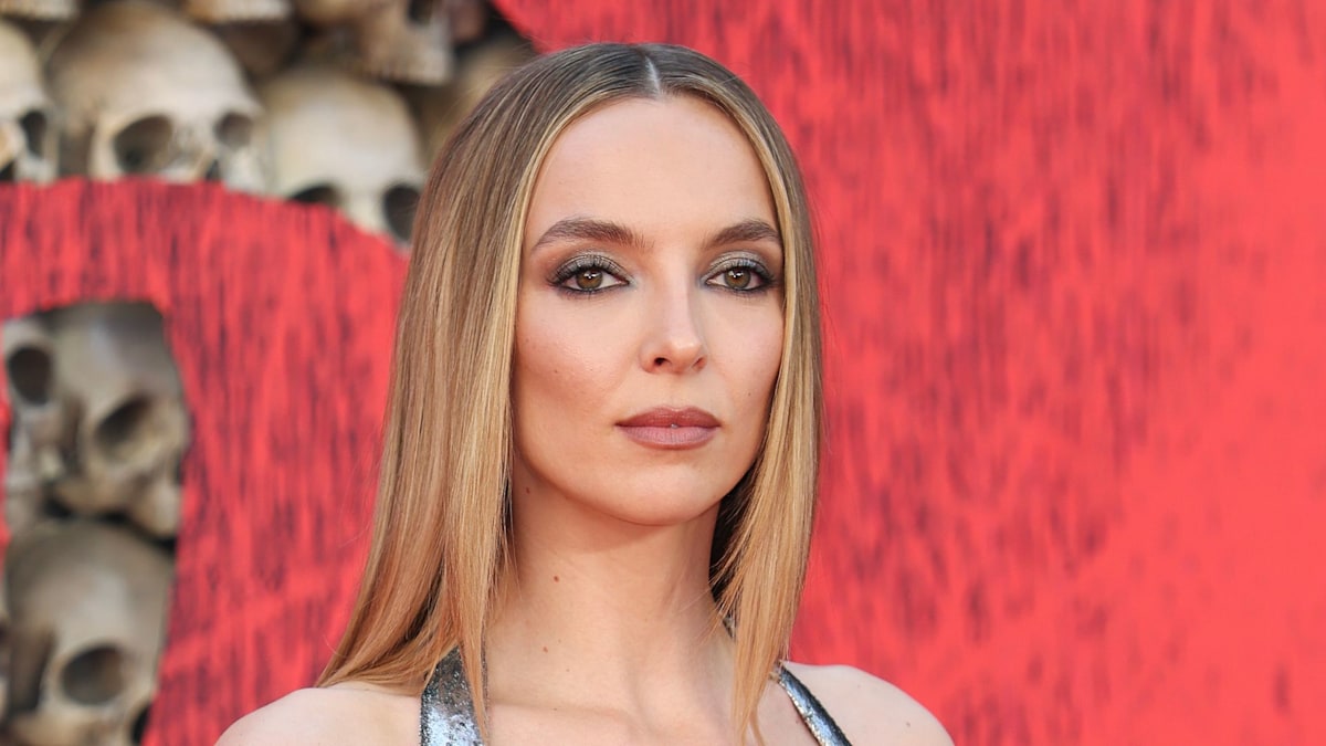 Jodie Comer's slim-fitting futuristic silver gown is a clever nod to her new film