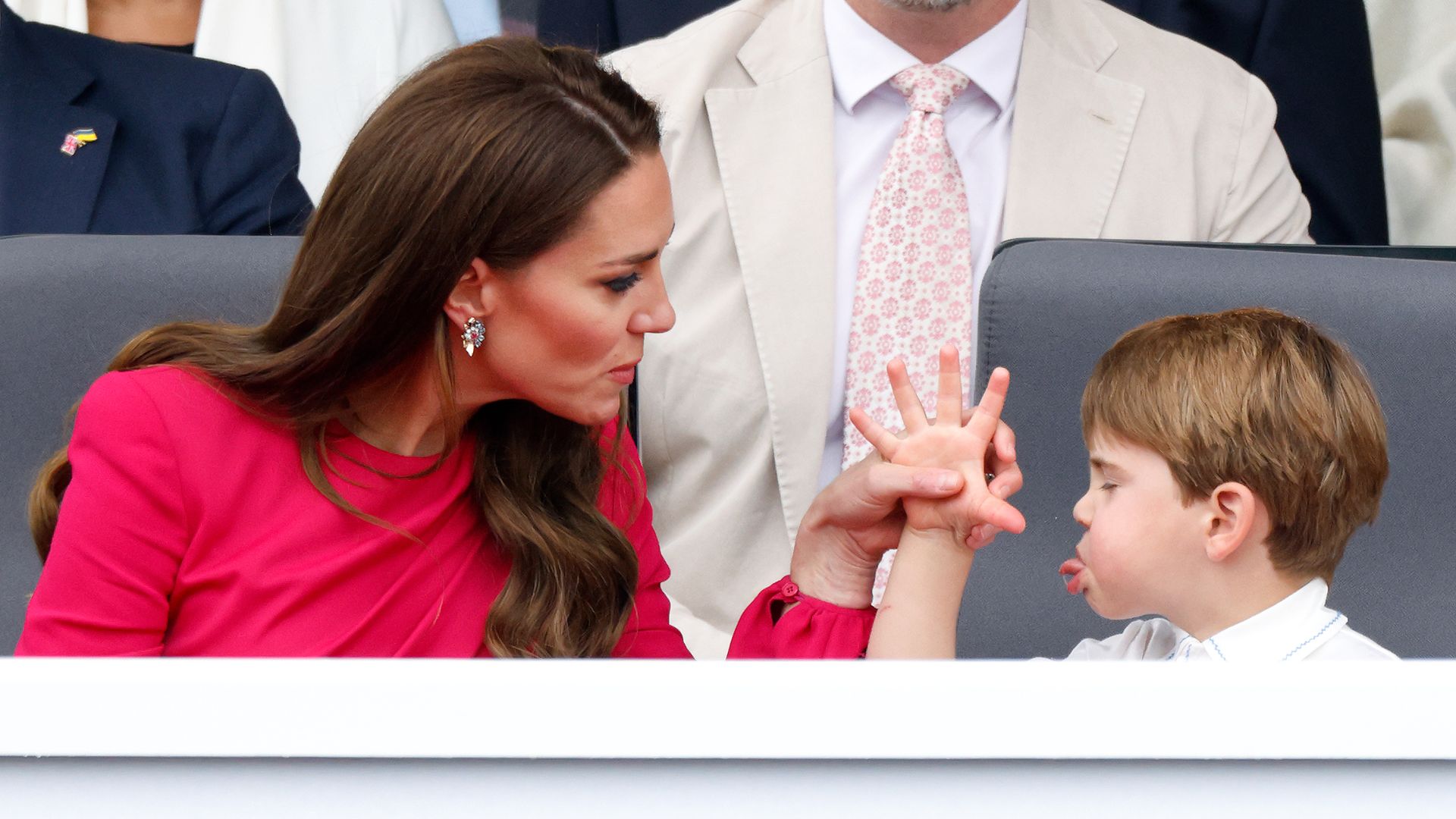 mother talking to son prince louis 