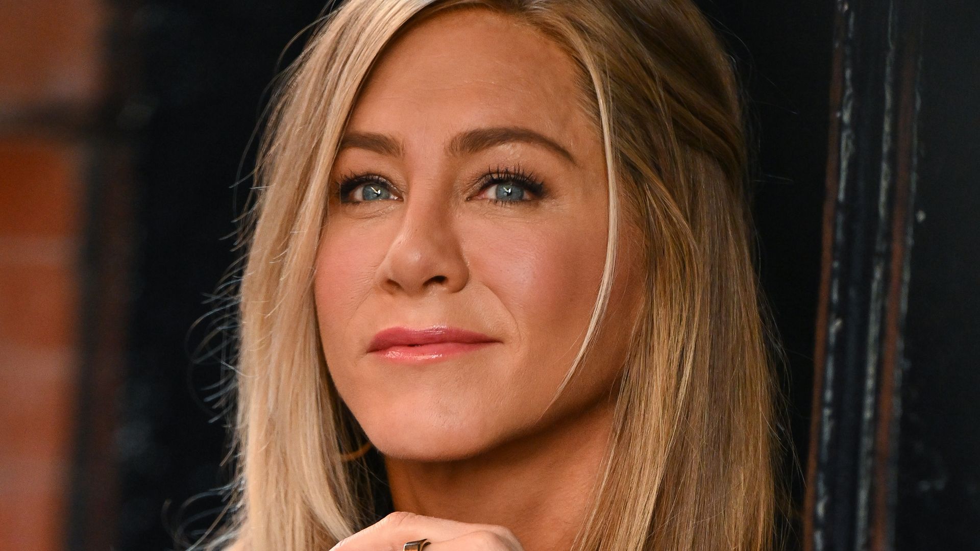 Jennifer Aniston just went braless in a 90s keyhole top – it’s so Rachel from Friends