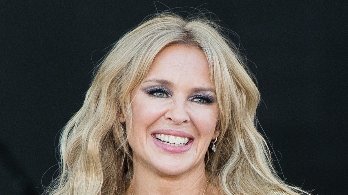 Kylie Minogue showcases toned legs in waist-cinching metallic coat | HELLO!