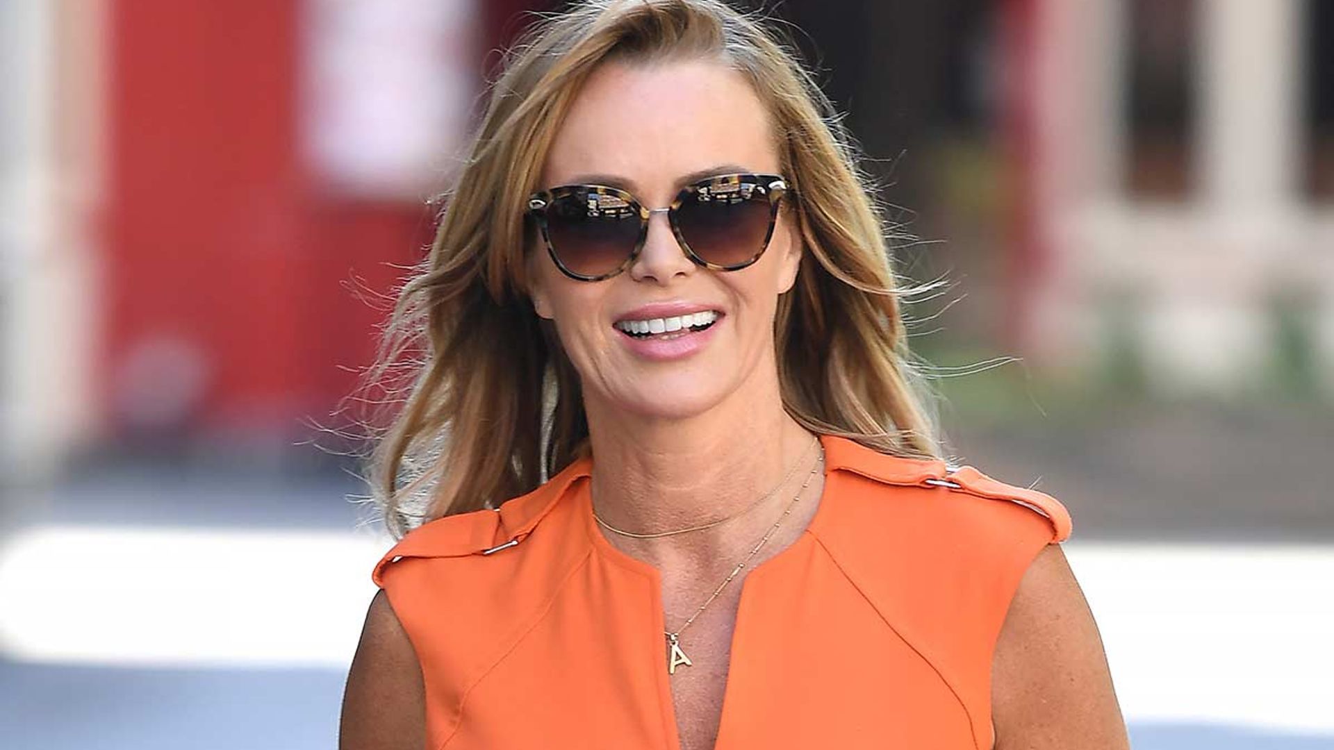 Amanda Holden's figure-hugging tangerine dress is perfect for summer – but it's selling fast!