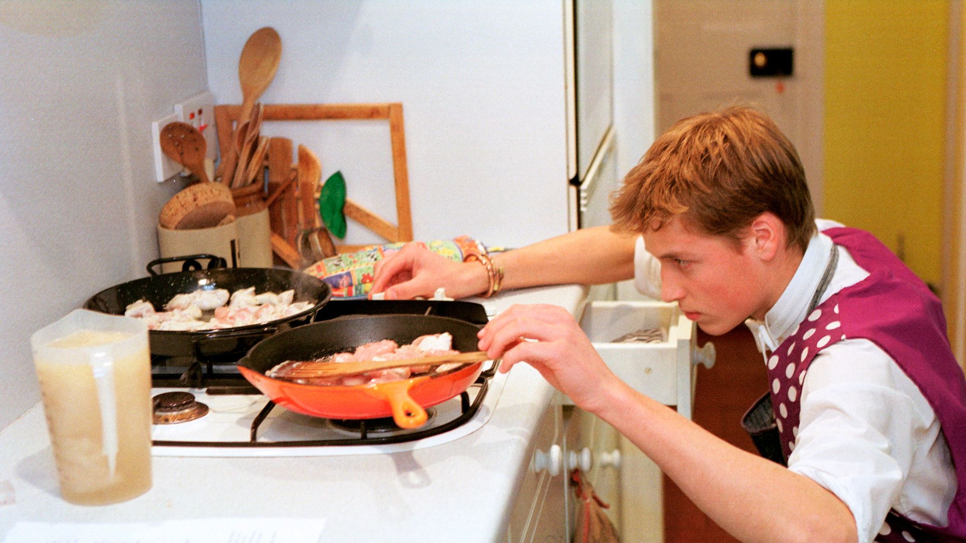 A young Prince William cooking