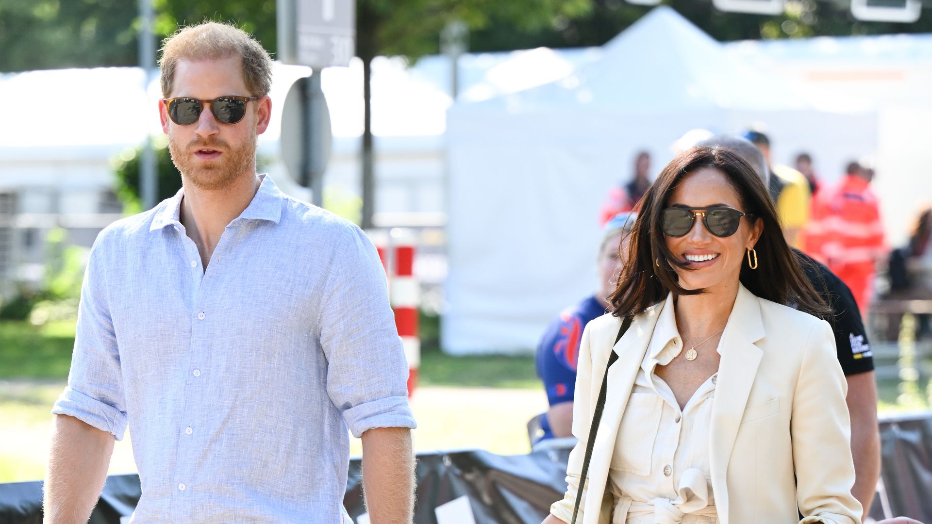 Prince Harry and Meghan Markle wearing sunglasses in Germany