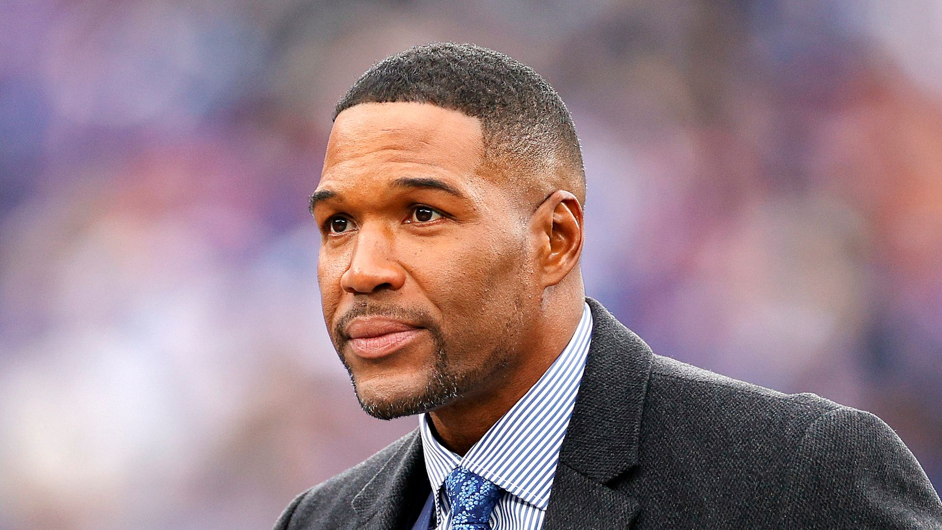 Former New York Giants player Michael Strahan speaks during the ceremony to retire his number at half time of the game between the Philadelphia Eagles and the New York Giants at MetLife Stadium on November 28, 2021 in East Rutherford, New Jersey.