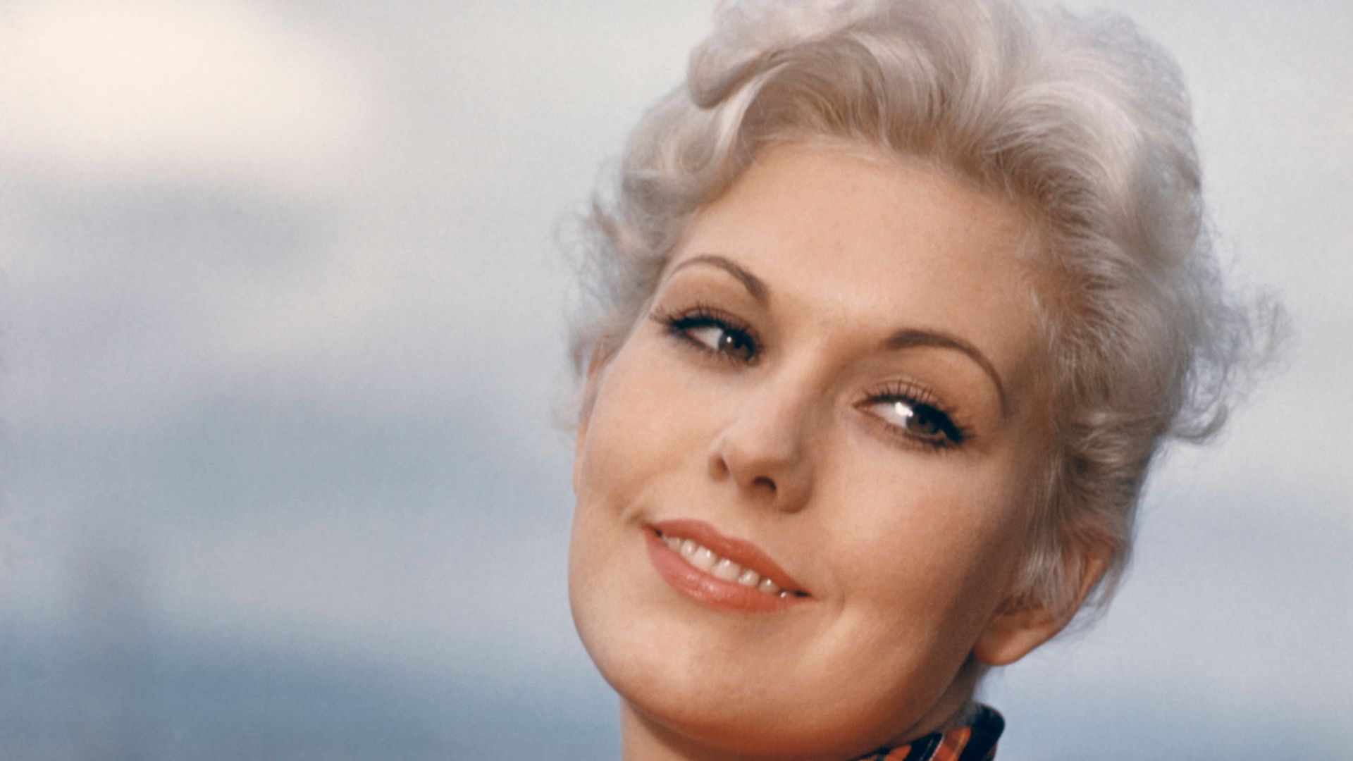 Kim Novak portrait in red coat from the Alfred Hitchcock thriller 'Vertigo' 1958. 