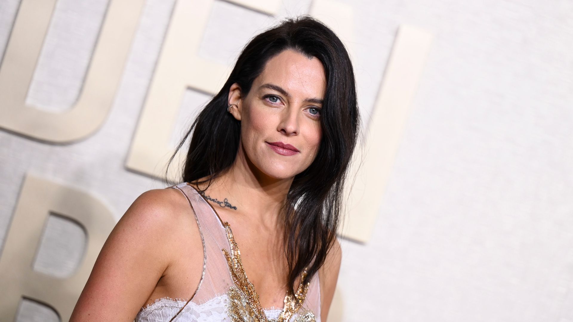 Riley Keough proves she’s the real-life Daisy Jones in a striking black sheer dress