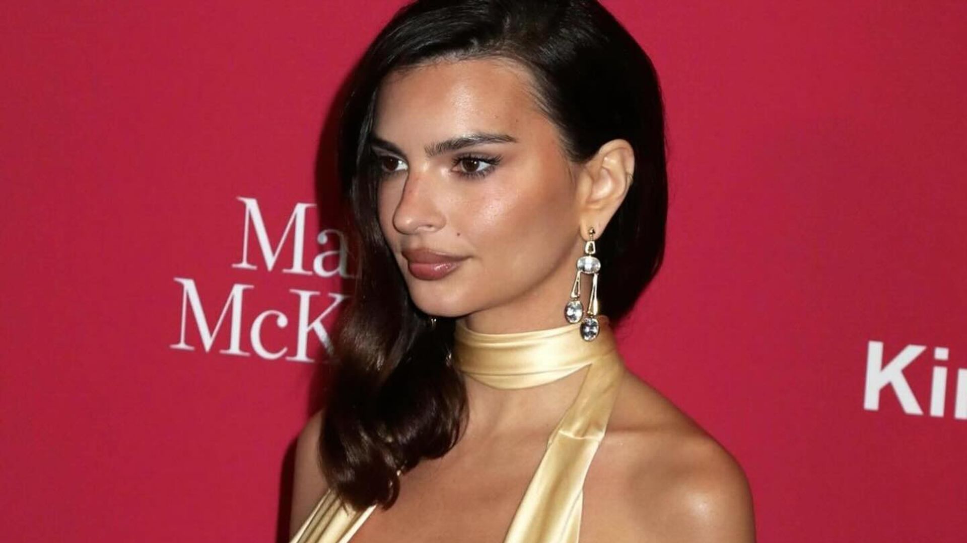 Emily Ratajkowski just wore a plunging neckline gown in spring's most notable hue