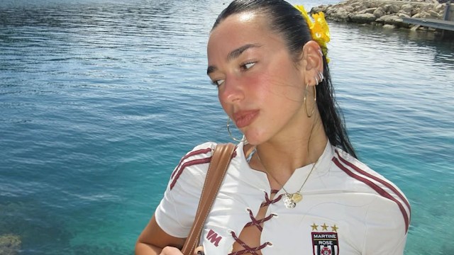dua lipa by the ocean in a lace up top