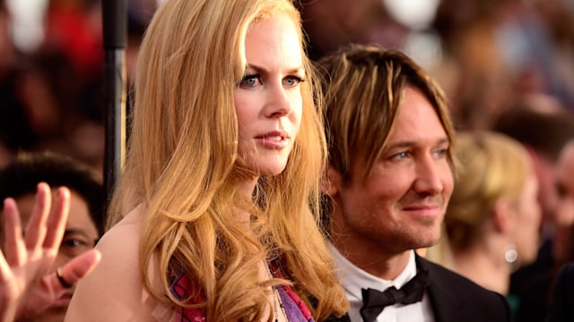 Nicole Kidman in a pink dress with her husband Keith Urban in a bow tie