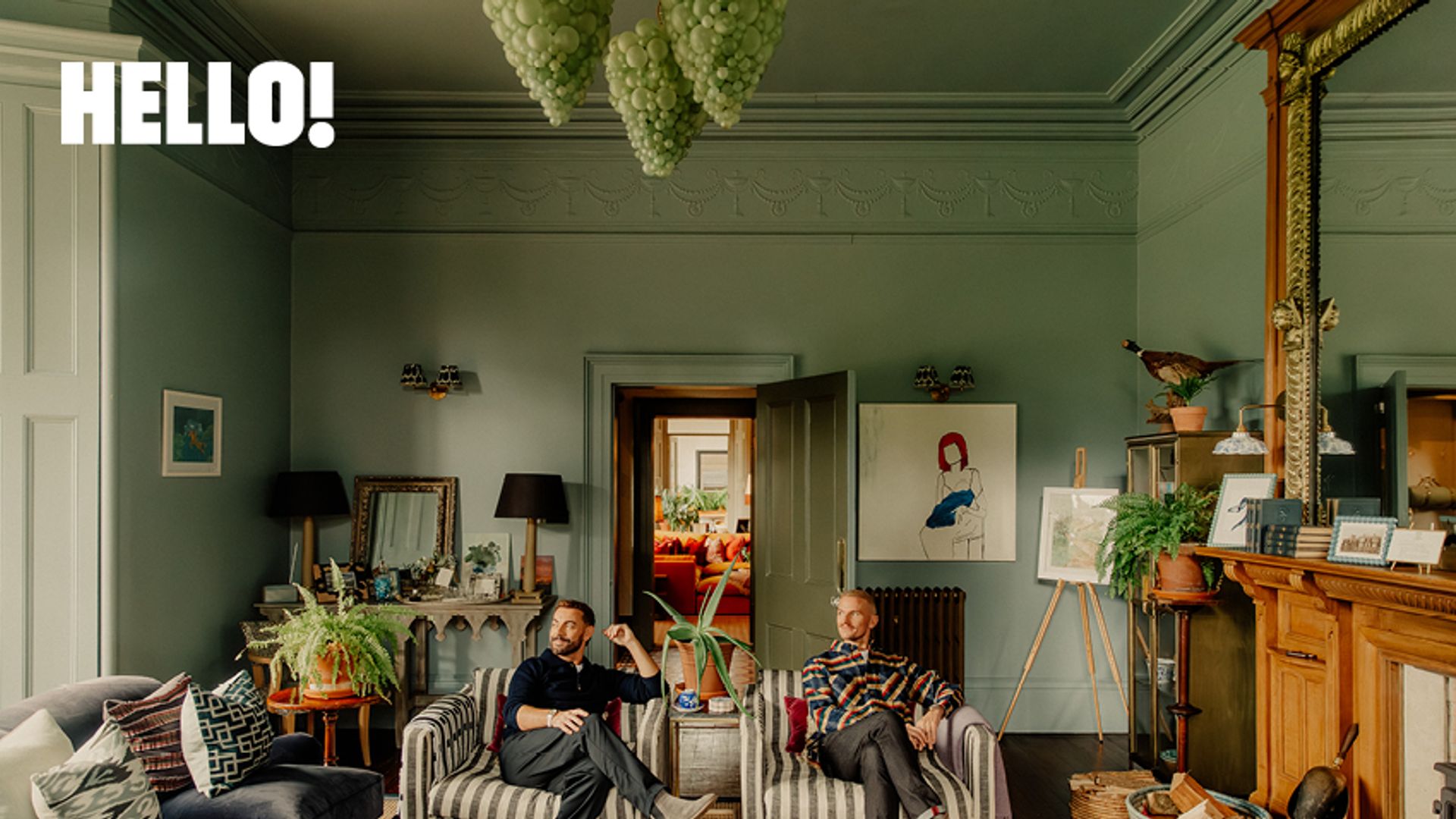 eclectically decorated room with green walls