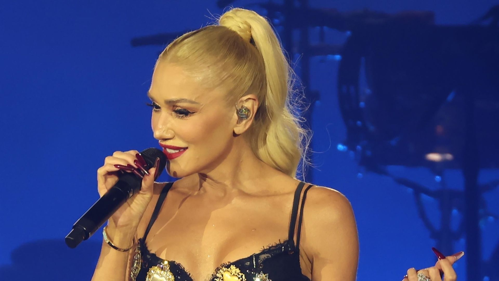 Gwen Stefani  in black bra performs at the Lenovo Tech World during CES 2026 at the Sphere in Las Vegas.
