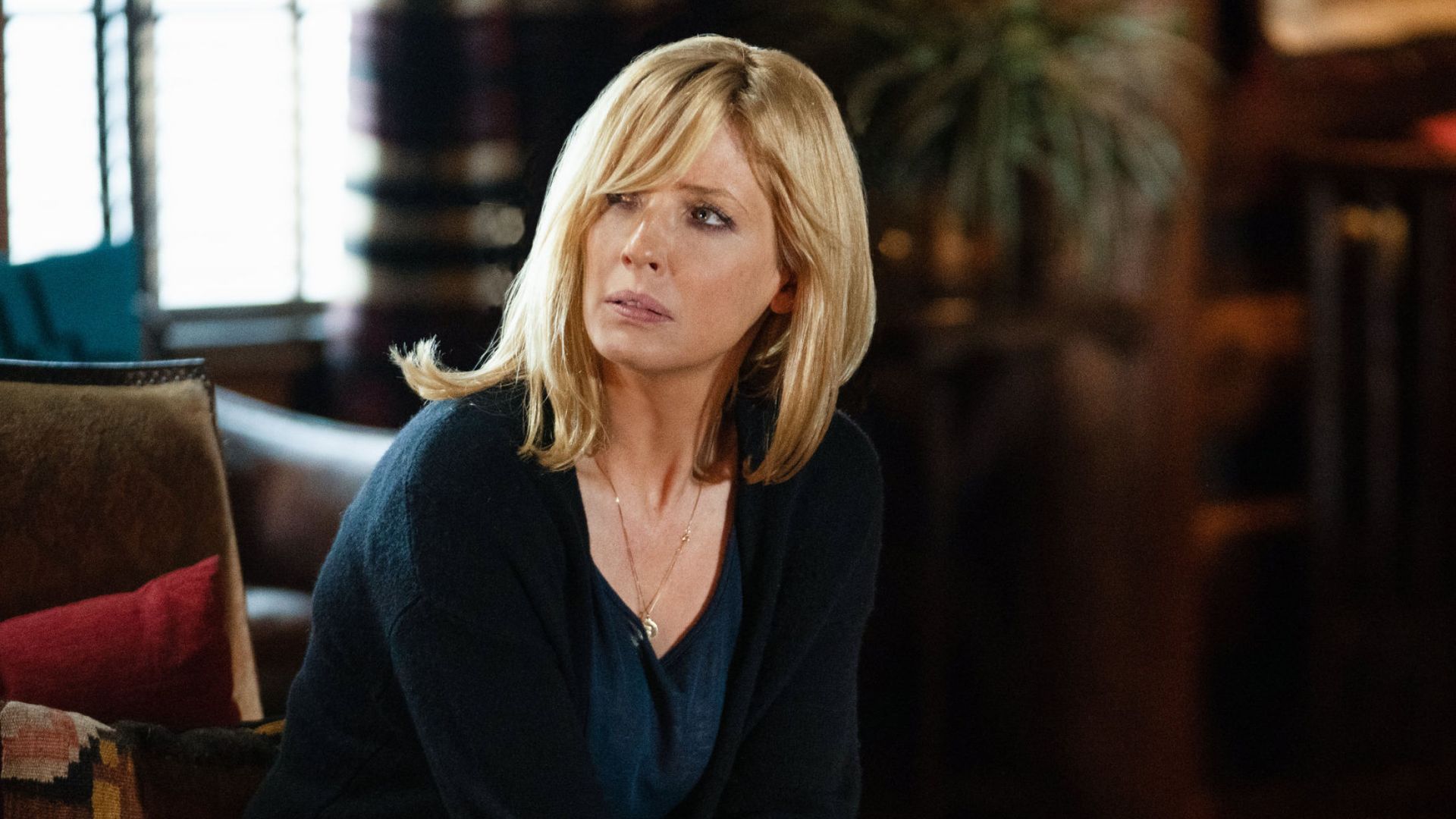 woman sitting in chair 