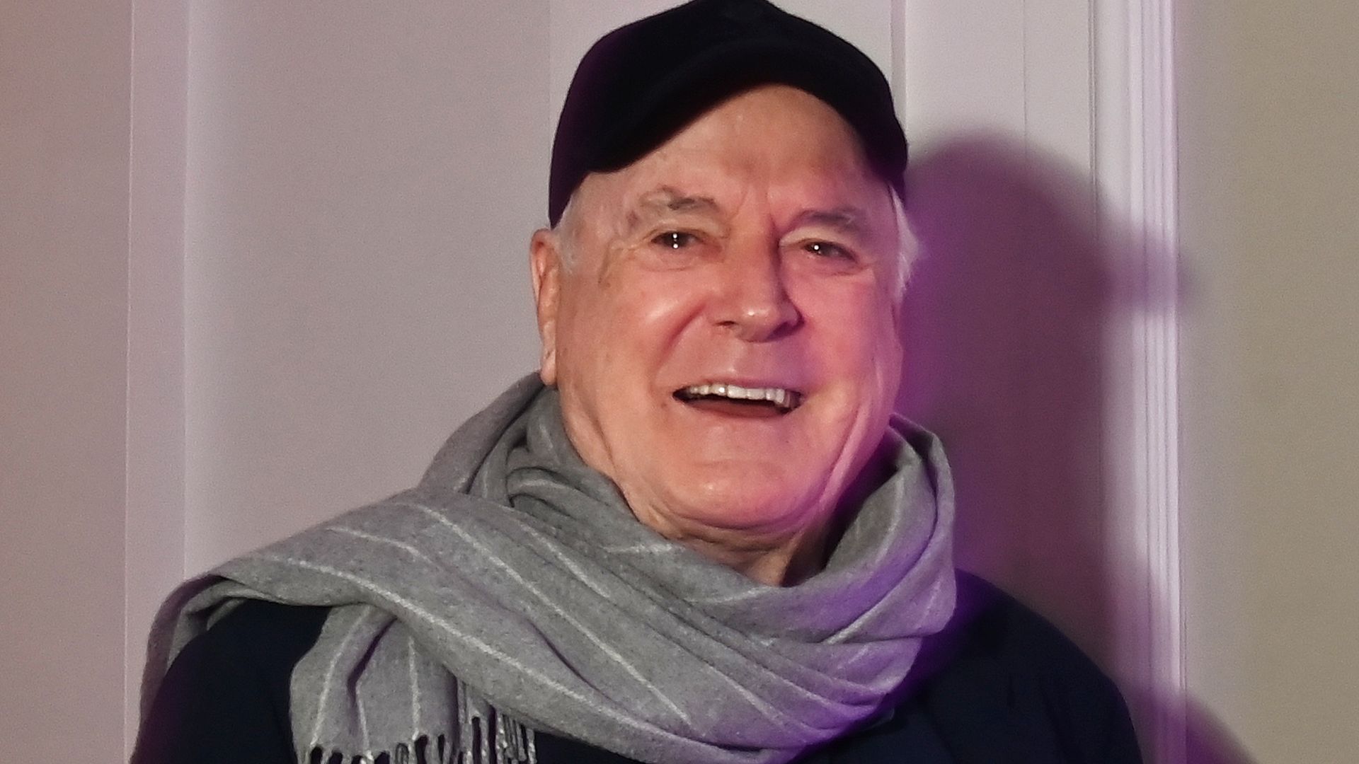 John Cleese, 86, rare outing with wife, Jennifer, 53, for surprise party full of A-listers