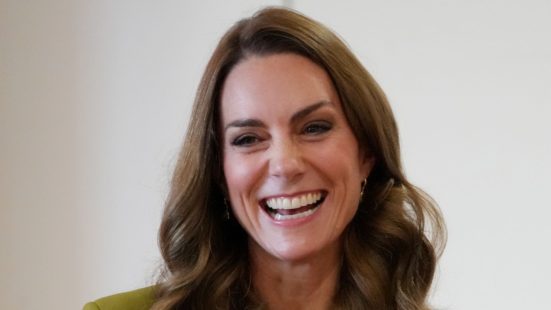 Catherine, Princess of Wales laughs she speaks to Home-Start Oxford volunteers, ahead of meeting and talking to families, along with the volunteers who support them, during her visit to Home-Start Oxford on October 9, 2025 in Oxford, England. (Photo by Kirsty Wigglesworth - WPA Pool/Getty Images)