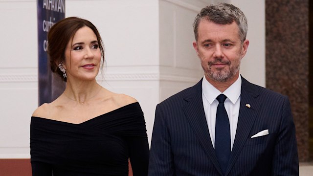 Queen Mary and King Frederik appearing to look bemused