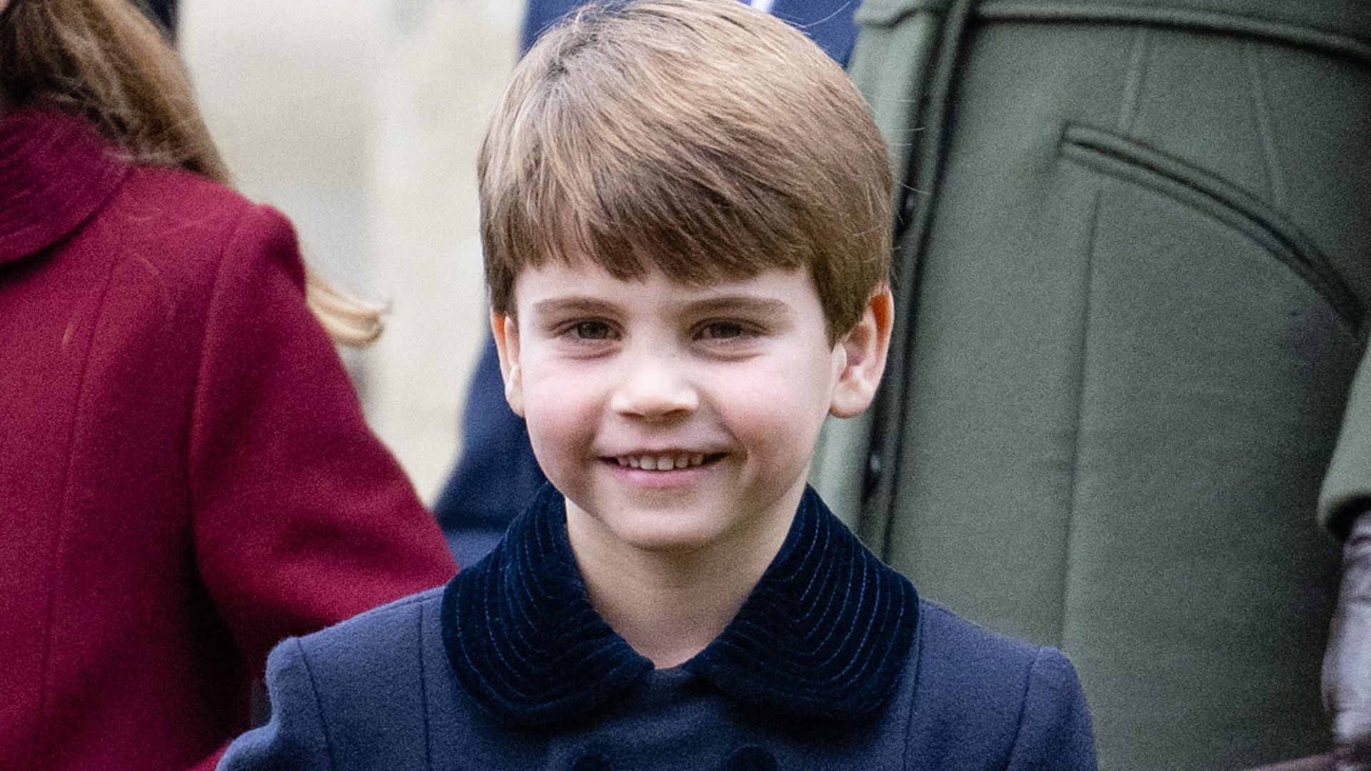 Cheeky Prince Louis shows off his outfit in adorable moment during Christmas walkabout