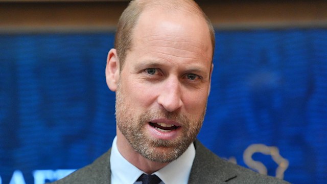 close-up of bearded man in suit