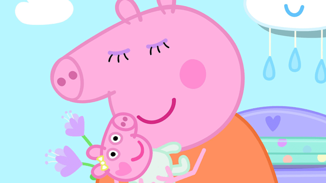 Mummy Pig holding new baby Evie