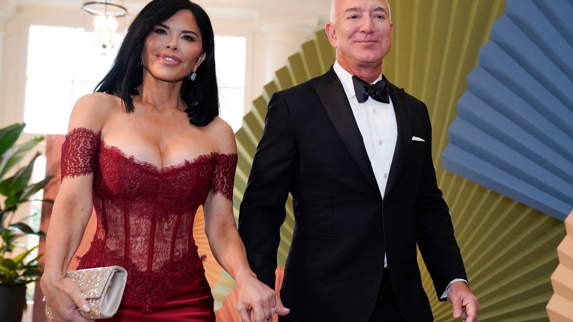 Lauren Sanchez dazzles in $2,200 gown as she and Jeff Bezos lead the glamorous arrivals at Joe Biden's state dinner