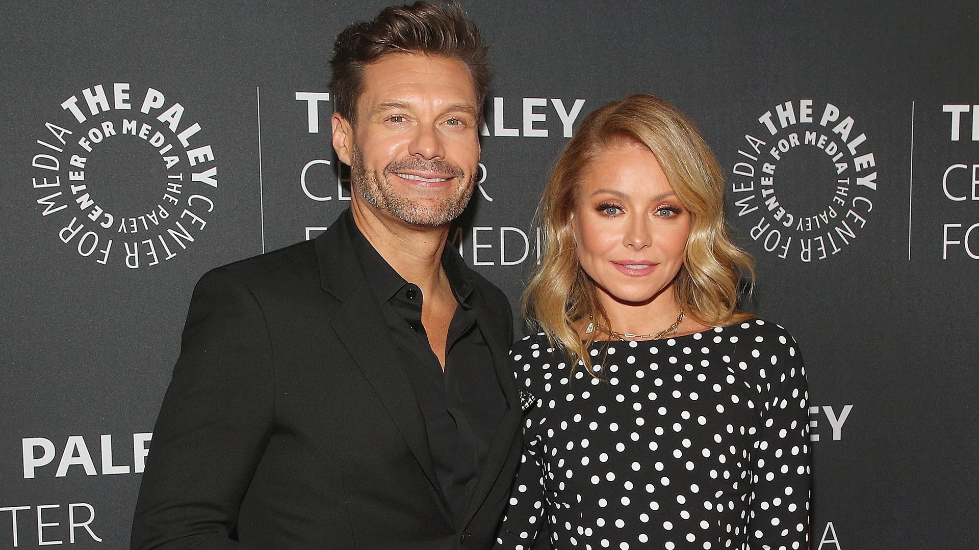 Kelly Ripa and Ryan Seacrest on a red carpet together