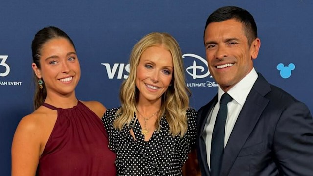 Photo shared by LIVE with Kelly & Mark on Instagram of Kelly Ripa posing with her husband Mark Consuelos and daughter Lola Consuelos at the D23 Disney Legends Event