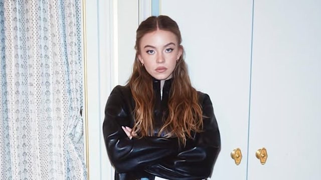 Sydney Sweeney poses in her hotel room before the SS25 show