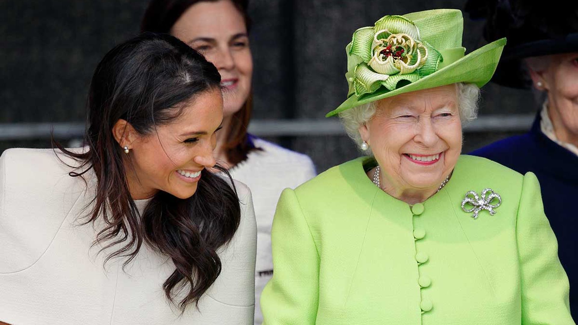 meghan markle the queen smiling