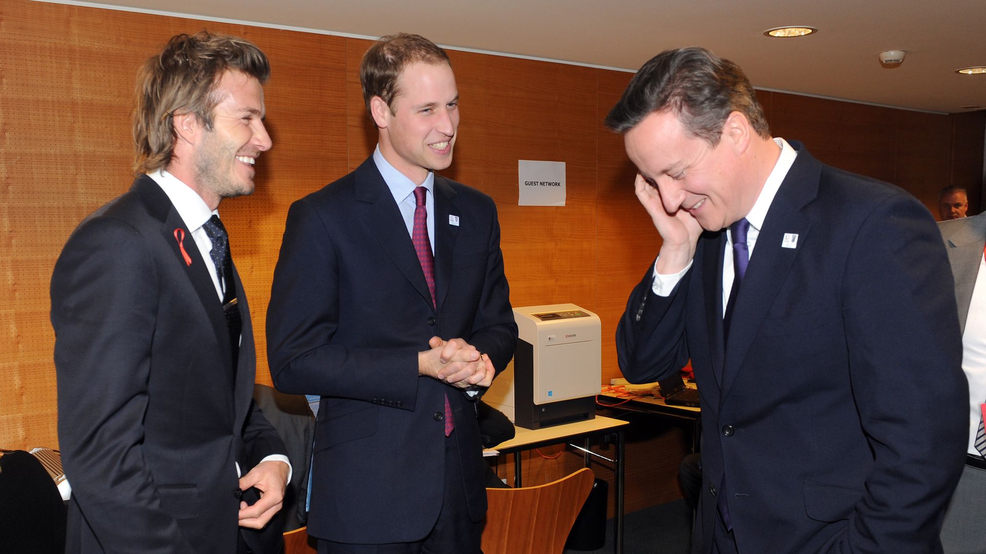 David Beckham laughing with Prince William and David Cameron