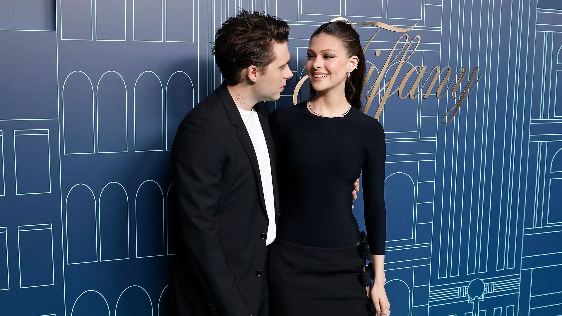 Nicola Peltz packs on PDA during loved-up appearance with husband Brooklyn Beckham
